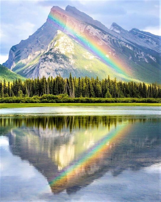 rainbow reflecting in Vermilion Lakes, canada